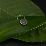 Abstract in a circle Nose Pin