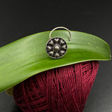 Abstract in a circle Nose Pin