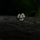 Emerald Zircon Swirl Nose Pin