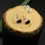 Tiny Black Ear Studs