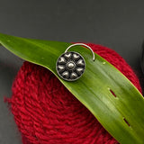 Abstract in a circle Nose Pin