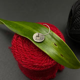 Abstract in a circle Nose Pin