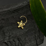 ⁠Zircon flower petals nose pin (gold plated)