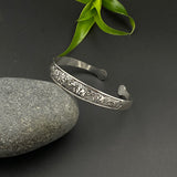 Ele Embossed Wrist Cuff