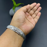 Ele Embossed Wrist Cuff