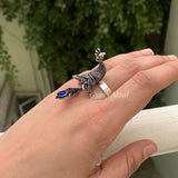 Peacock With Blue Stone Ring